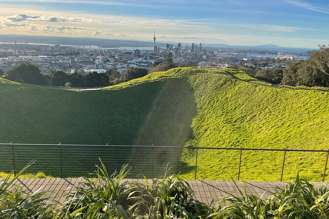 Auckland Highlight Attractions Small Group Tour - Mission Bay closes the tour beside the water
