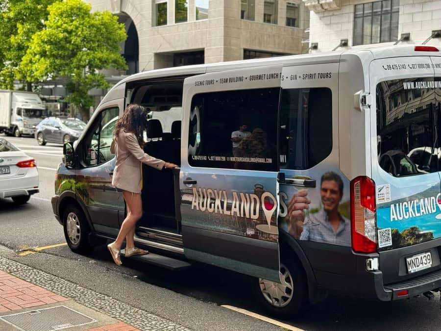 Auckland: Wine region tour with tastings and gourmet lunch - Crossing the Harbour Bridge into wine country