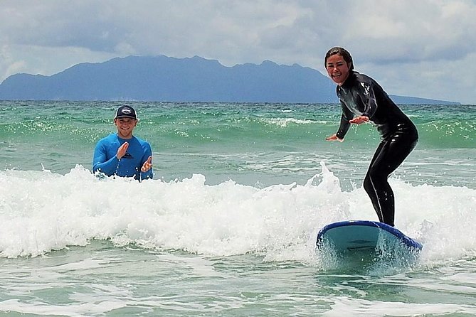 Beginner Surf Lesson at Te Arai Beach - Moving into the water at Te Arai and Omaha
