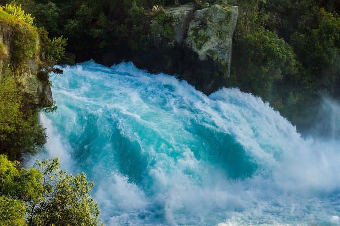 Lake Taupō Private Day Tour from Auckland to Māori Rock Carvings - Huka Falls shows water power at close range