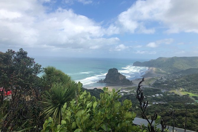 Piha Waitakere Rainforest Wine Tour from Auckland - Riding west from Auckland