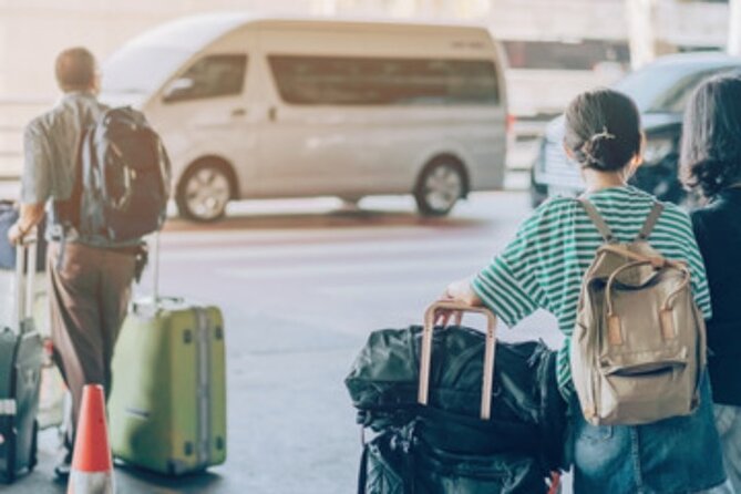 Private One-Way Transfer: Auckland Airport to Auckland City Hotel - A private Toyota hybrid for three passengers