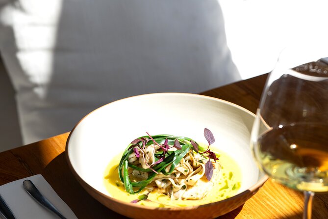 Waiheke Island: Afternoon Wine Affair with Ocean Front Lunch - Mudbrick Vineyard closes with Auckland views