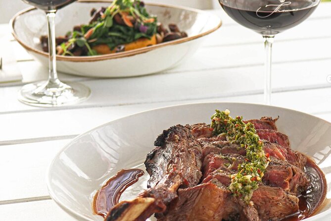 Waiheke Island Wine Tour with Scenic Vineyards & Tastings - Batch Winery, lunch, and water views