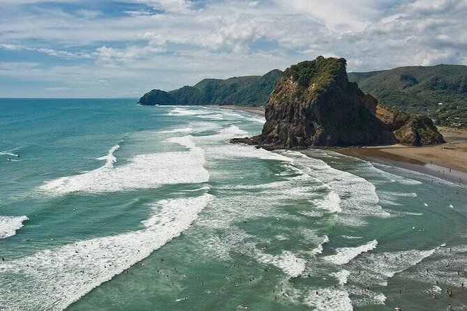 West Coast Discovery Tour - Piha Beach, black sand, and Lion Rock